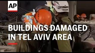 Buildings damaged in Tel Aviv area following Iranian missile attack