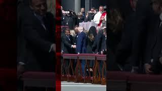 Trump and Macron shake hands, as pope funeral crowds encouraged to do so as sign of peace. #BBCNews