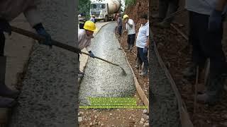 Road Expansion Efforts: Concrete Pouring in Progress