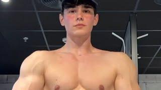 Handsome muscular teen boy flexing muscles