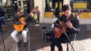 Amazing Spanish Guitar Street Performers Due playing live music