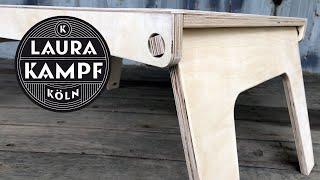 Simple folding table with wooden hinges