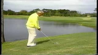 Arnold Palmer attempts the water shot