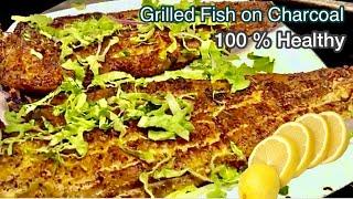 Grilled fish | How to grill whole fish on a charcoal grill | Lahore street food.