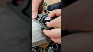 how to assemble insert bearing into bearing housing?