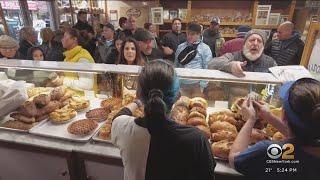 Huge crowds shopping on Arthur Avenue