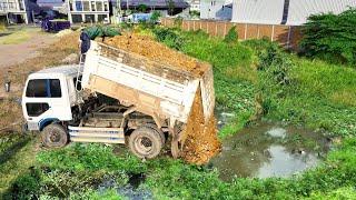 Start New Project!Driver Showing Machine Dozer D31P Pushing Soil Perfect, Dump Truck Filling Land Up
