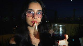 a glass of wine, a cigarette and the end of a day