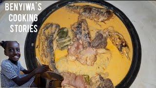 A typical Ghanaian local way of making wr3wr3 Soup/ melon seed soup  with fufu.