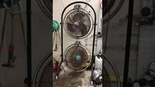 Windy brand industrial/commercial duty portable fan in a car repair garage