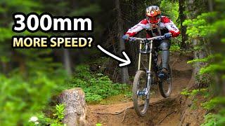 300mm vs 200mm of suspension, Does more travel = more speed?