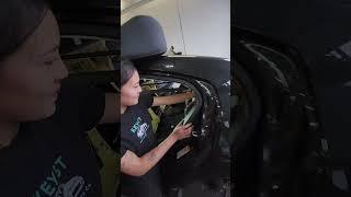 Girl mechanic removal of rear seat  for struts removal lexus