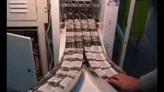 Automatic collating machine for tea bags.
