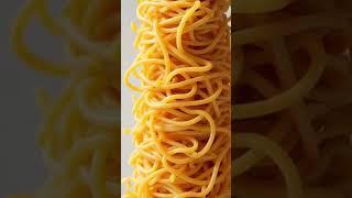 A spaghetti tower tangled lime vines wrapping around a building