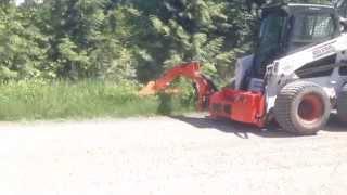 Excellent Roadside Mowing with a Bobcat Mounted Boom Arm Mower System