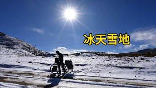 冬季騎行西藏，翻越雪山一路下坡來到小村子，前方的路大雪封山了