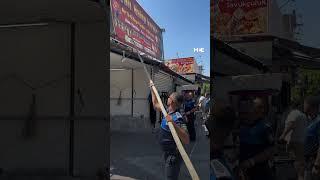 Turkish policemen remove Arabic shop signs in Adana