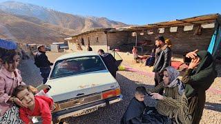 A rural family Mahdi and Tahmoorth's efforts to get the car out of the parking lot.