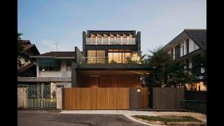 Vale House - a contemporary tropical home with a minimalist kitchen and central garden courtyard.