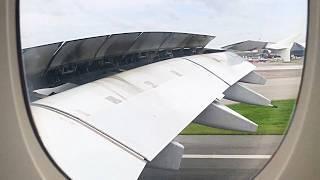 Inside the giant Airbus A380 landing with a view of the huge Emirates wing