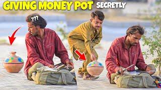 Giving Money Pot Secretly.