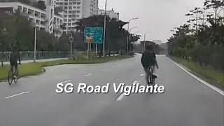 21mar2025  Punggol north Avenue cyclists in all black no helmet cycling thru and fore all 3 lanes