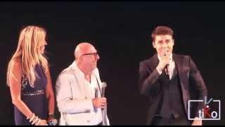 Nolan Funk presents an award in Italian at the Taormina Film Festival