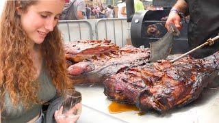 Street Food Festival in Spain. Orgy of Juicy Pork Loin Roasted and Cut. Meat&Fire Event, Barcelona