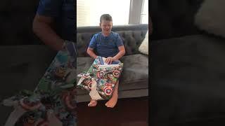 Kid unboxing ps4 for the first time