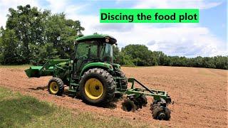 #123 Discing the dove food plot! John deere 4066R