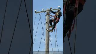 Rural Electrician Danger : No Helmet Strap, Throwing Pulleys