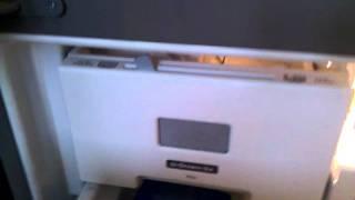 Freezer Door Being Held Open by Ice Scoop
