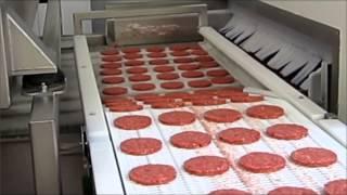 Burgers on IQF Freezer Tunnel