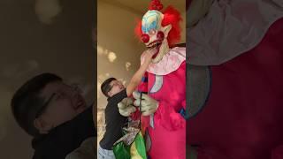 Son gets his hand bitten by a killer clown! #shorts