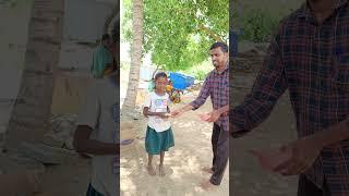 Thrilling Water Bucket Ball Challenge: Village Women Skillfully Drop Balls into Rotating Buckets