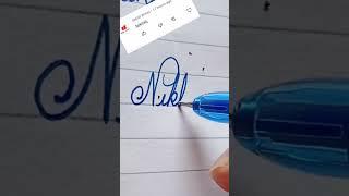 Nikhil name write in cursive writing #cursive#writing#khushicursivewriting#improveyourwriting#short