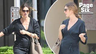 Pregnant Gisele Bündchen shows off baby bump while running errands in Miami