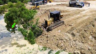 Wonderful technique pushing skill with Komatsu D41P Dozer in landfill area in action