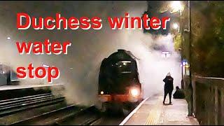 Duchess of Sutherland steam locomotive - winter water stop