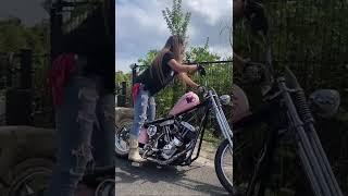 Biker girl kicking that pink Harley-Davidson chopper again!!!