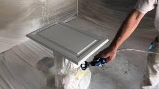 How to spray cabinet doors with an airless sprayer. FFLP 312 tip Sherwin Williams Pro Classic Hybrid