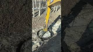 Process Of Excavator's Grapple Rotating In Circles On The Ground !