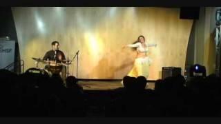 Soca Defense Cassandra Fox dancing and Joel Jacobs playing Djembe at Humber Arts Fest