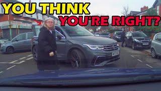 WOMAN JUMPS OUT TO SCOLD DRIVER AFTER BLOCKING HIM