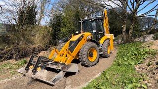 Jcb 4cx backhoe loader levels stone