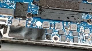 Taking the time to inspect the motherboard of a Lenovo laptop that encountered some sticky liquids