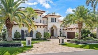 This $6,670,000 Timeless architectural Home in Boca Raton has a open floor plan with golf views