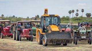 JCB 3DX Plus Loading Murum in New Holland Mahindra Sonalika Eicher Kubota Tractor for Farming Land