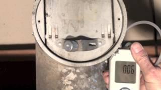How to set the oil furnace barometric damper
