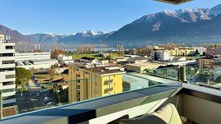 Modern penthouse apartment with lake view for sale in a central location in Locarno, Switzerland